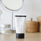 Swatch de Mon billet poudré : Gradual Tan Face Light/Medium, St. Tropez