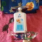 Swatch de Paillettes cosmiques : Lait après soleil Sun care, Just