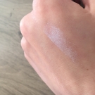 Swatch de Ophé01 : Liquid Crystal Glow Gloss, Becca