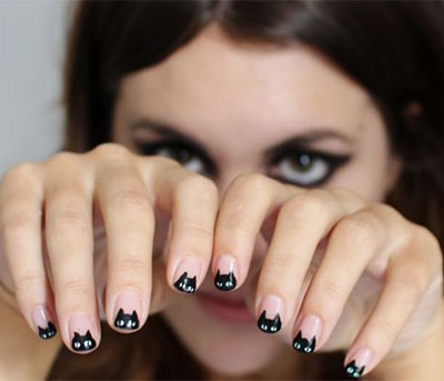 des chats noirs pour une manucure pour halloween