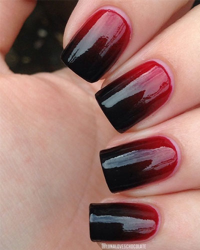 une manucure ombre rouge sang