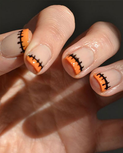 un nail art avec une plaie recousue