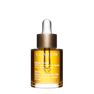 huile santal clarins 